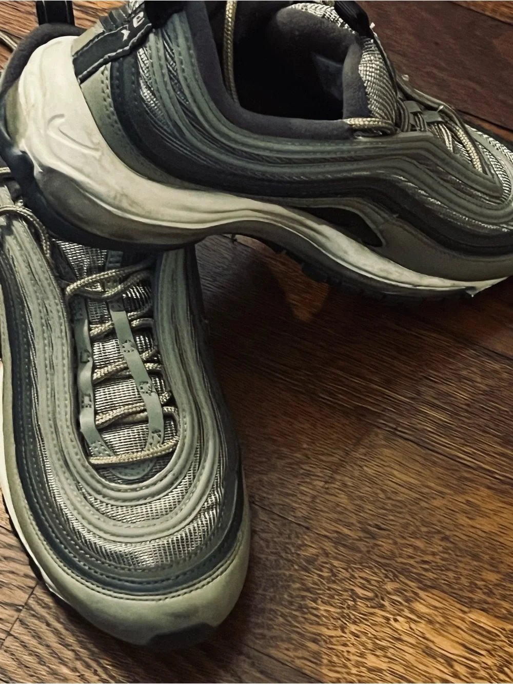 Nike women’s Air Max 97 in Olive Green . Size 8.5. Gently used.